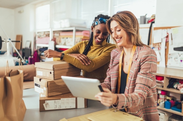 two women in their business