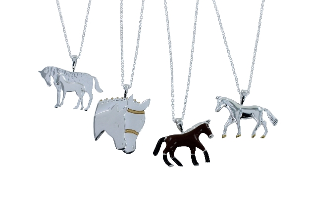 silver necklace in the shape of horse heads