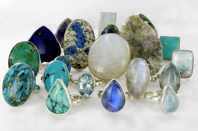 group of silver rings with all different stones