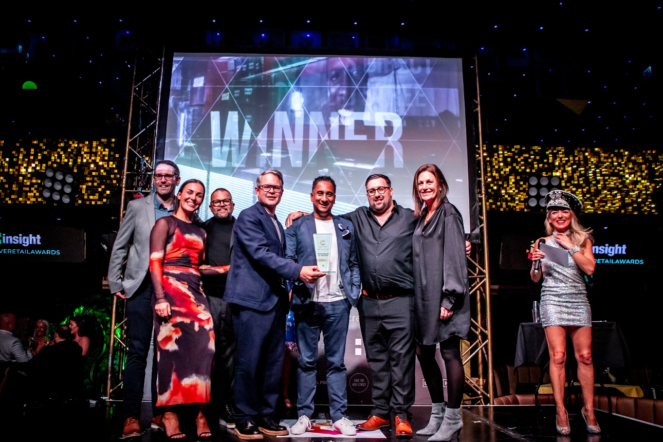 Creative Retail Awards group on stage winning awar