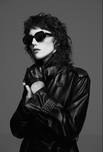 model in leather jacket and dark glasses