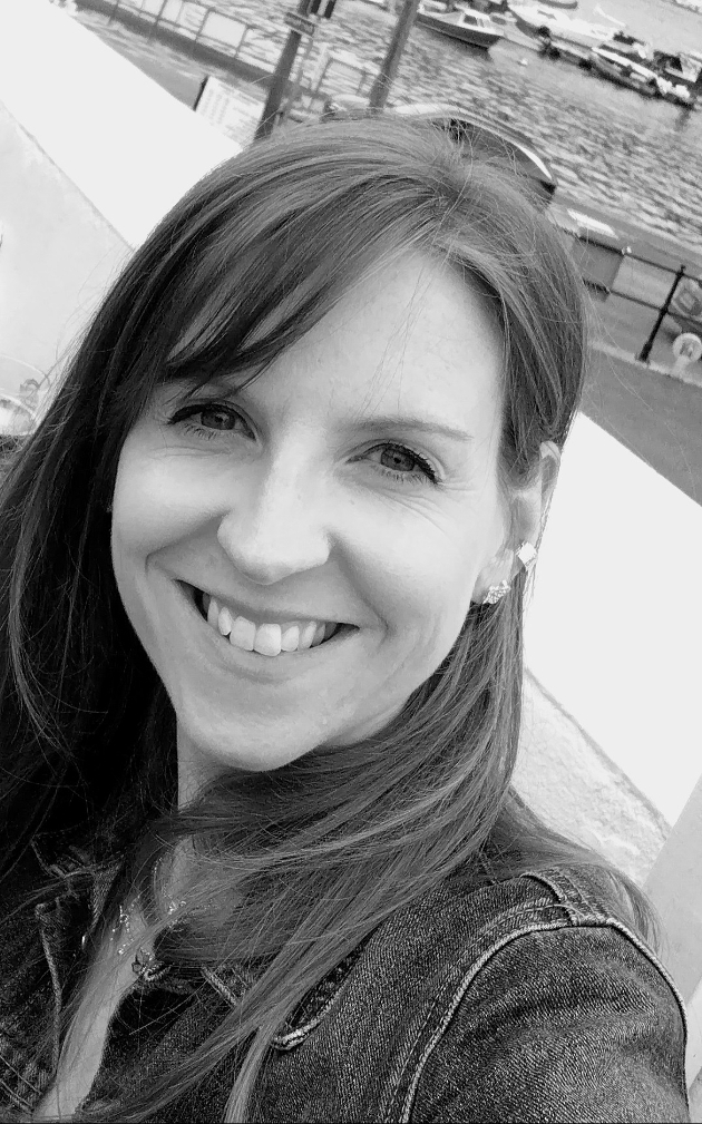 black and white portrait shot of lady with mid length brown hair